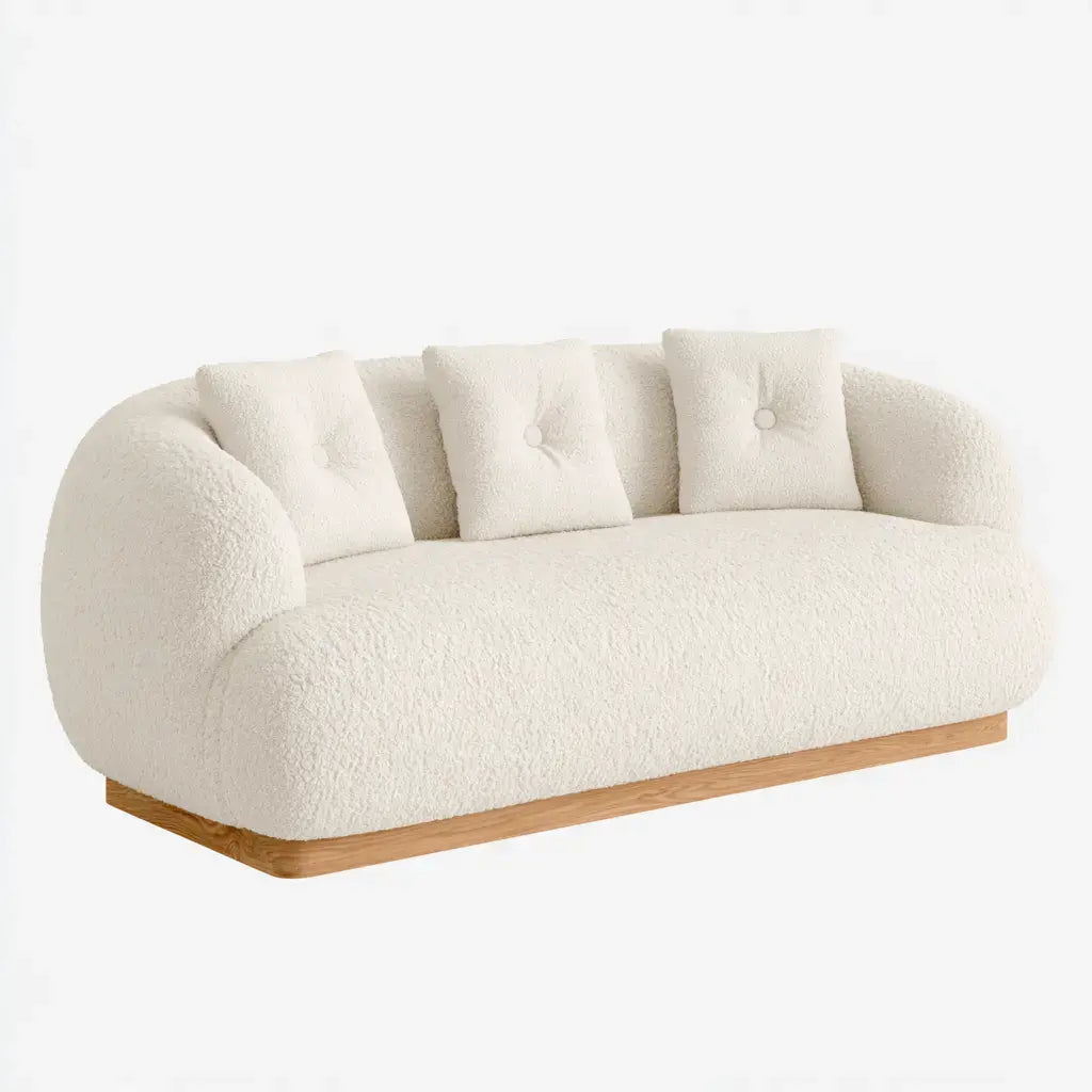 Sofá beige con respaldo curvo y base continua de la marca modularsofahaven, ideal para salas modernas y confortables.