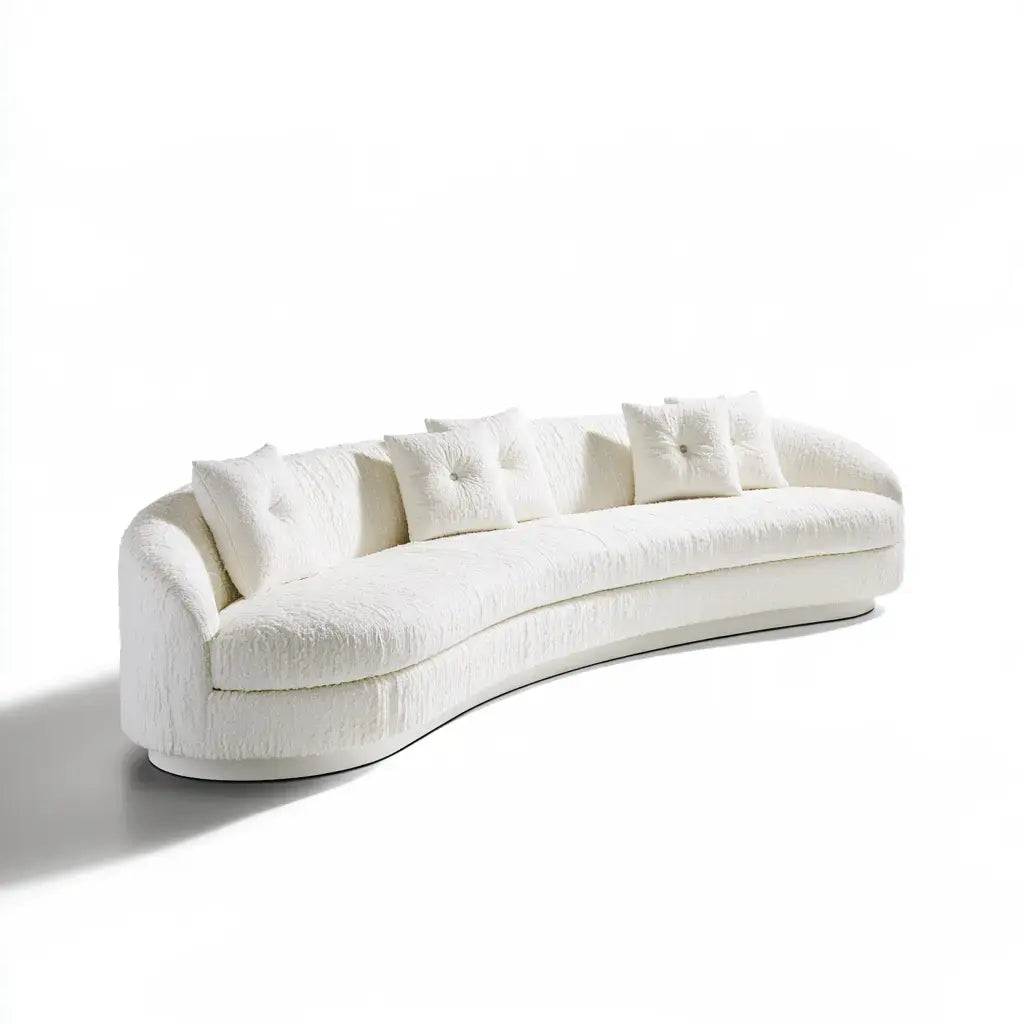 Sofá curvado beige de la marca modularsofahaven con cojines decorativos, estilo moderno y cómodo para sala de estar.
